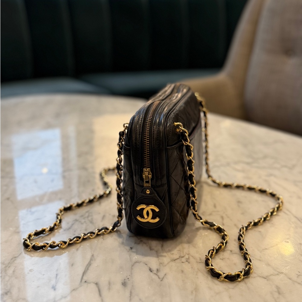 CHANEL Quilted Black Lambskin Leather Camera Bag with Gold Chain